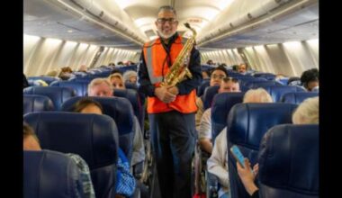 Holiday travel hits a sweeter note as Southwest Airlines worker plays sax at Houston airport