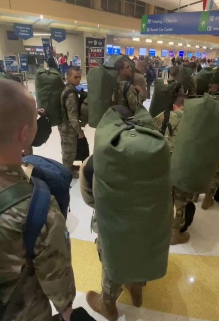 Service members traveling through San Antonio International for the holidays