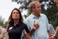Sen. Angela Paxton, R-McKinney, and her husband, Texas Attorney General Ken Paxton, speak to...