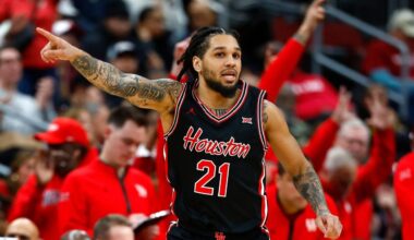 Sharp scores 22 points to lead No. 8 Houston over No. 14 Arkansas, 94-85