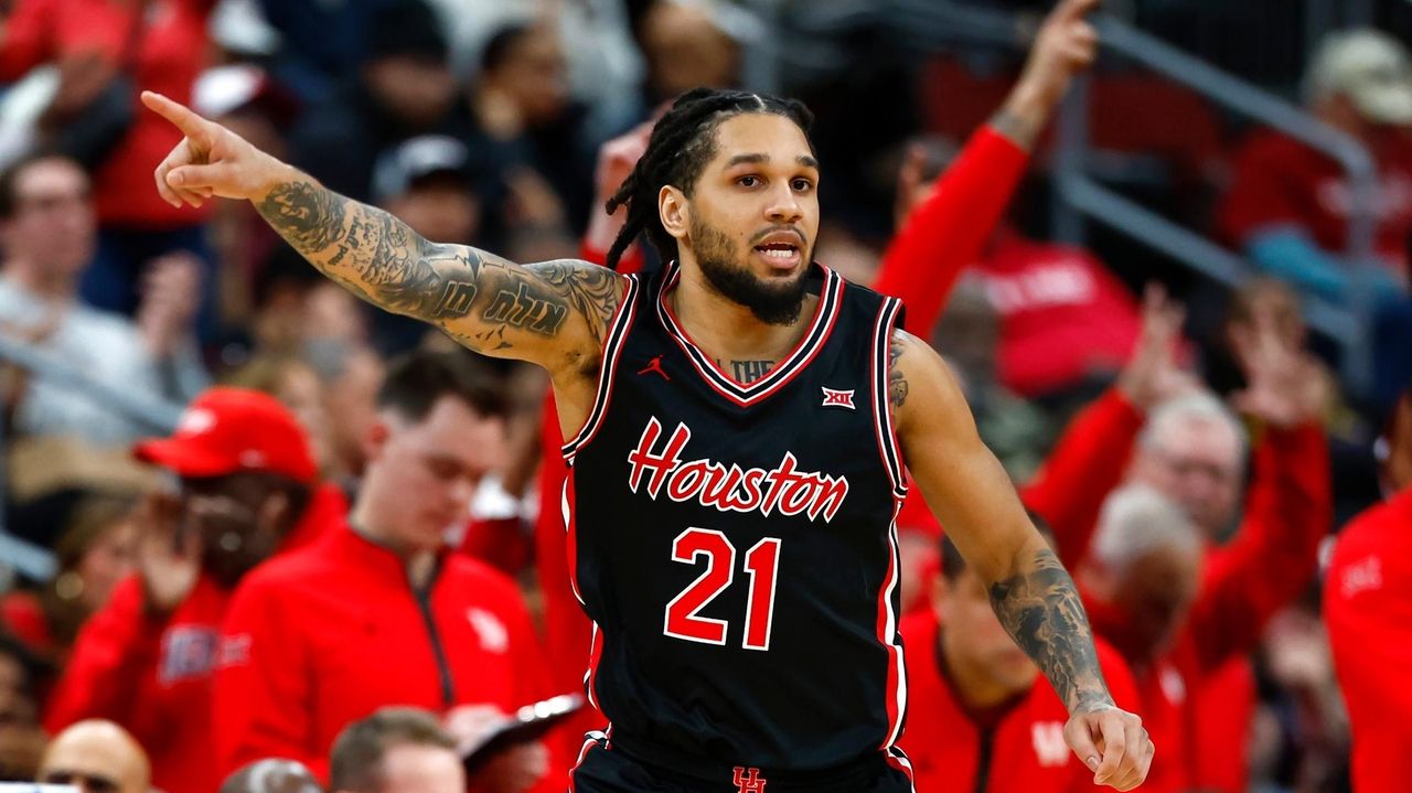 Sharp scores 22 points to lead No. 8 Houston over No. 14 Arkansas, 94-85