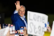 Gov. Greg Abbott waves to supporters as he announces his reelection campaign for Texas...