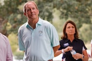 Attorney General Ken Paxton (left) and his wife, Sen. Angela Paxton, R-McKinney, listen to...