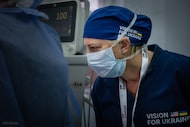 Nancy Hairston, CEO of Dallas-based MedCAD, in operating room during "Vision for Ukraine"...