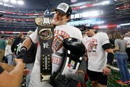 Texas Tech linebacker Ben Roberts (13) is congratulated after their victory against the BYU...
