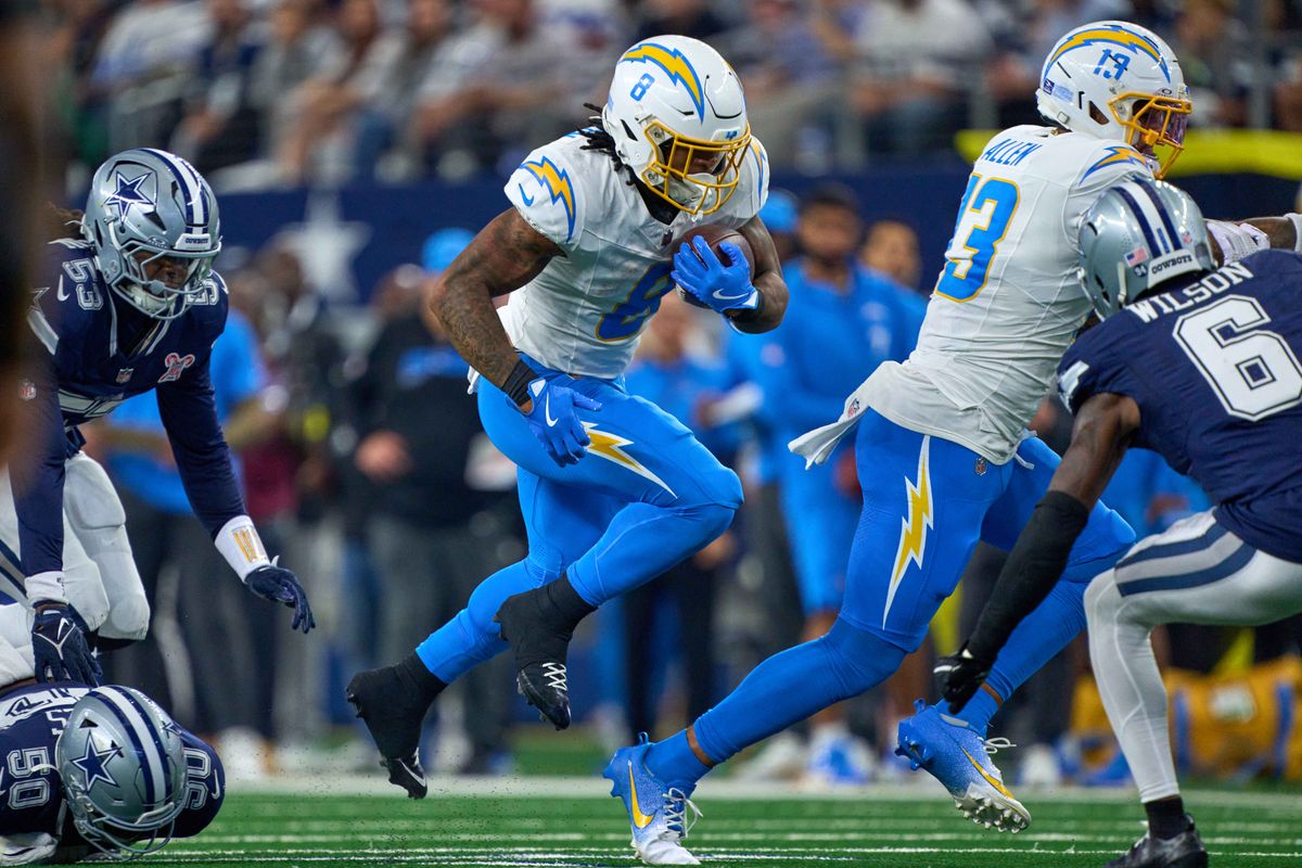 Los Angeles Chargers running back Omarion Hampton #8 runs the football during an NFL football game against the Dallas Cowboys, on Sunday December 21, 2025 in Arlington, Texas. Los Angeles Chargers running back Omarion Hampton #8 runs the football during an NFL football game against the Dallas Cowboys, on Sunday December 21, 2025 in Arlington, Texas.