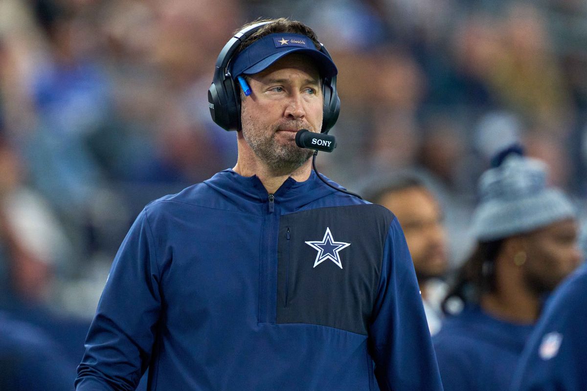 Dallas Cowboys head coach Brian Schottenheimer looks on during an NFL football game against the Los Angeles Chargers, on Sunday December 21, 2025 in Arlington, Texas. Dallas Cowboys head coach Brian Schottenheimer looks on during an NFL football game against the Los Angeles Chargers, on Sunday December 21, 2025 in Arlington, Texas.