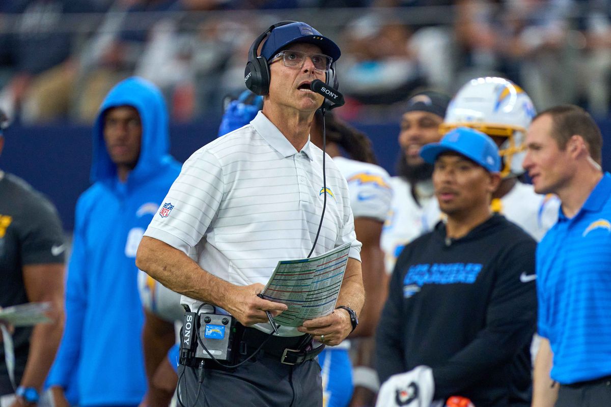 Los Angeles Chargers head coach Jim Harbaugh looks on during an NFL football game against the Dallas Cowboys, on Sunday December 21, 2025 in Arlington, Texas. Los Angeles Chargers head coach Jim Harbaugh looks on during an NFL football game against the Dallas Cowboys, on Sunday December 21, 2025 in Arlington, Texas.