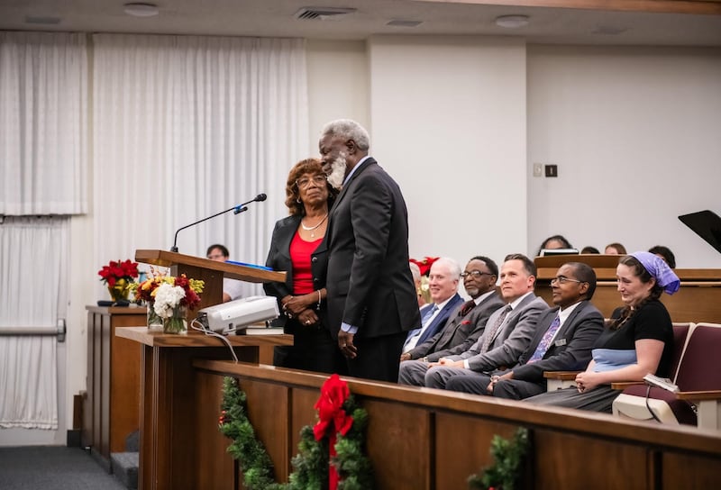 Vernon and Linda James accept their service award and speak about the 40 years of the Fort Worth Save Our Children Learning Center at the Saints in Unity devotional in Fort Worth, Texas, on Nov. 16, 2025.