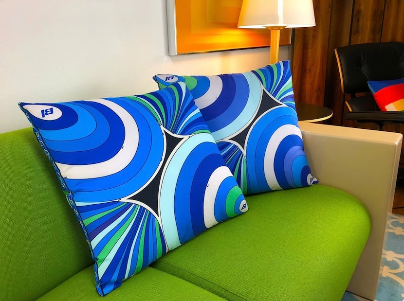Braniff Pucci-design throw pillows recall the high-flying days of the defunct Dallas airline.