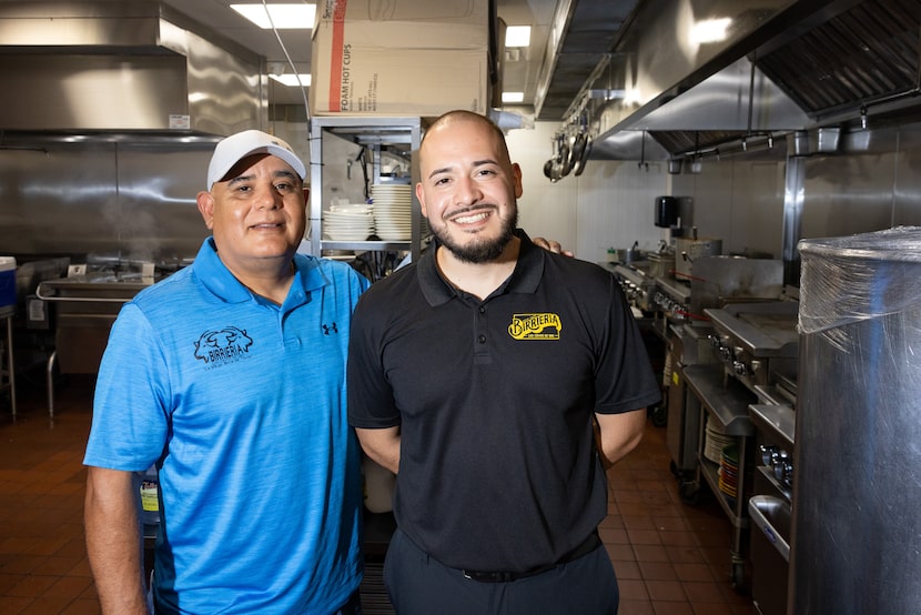 Restaurant operators Ricardo Luis and Ricardo Luis Jr. stand for a portrait inside of the...