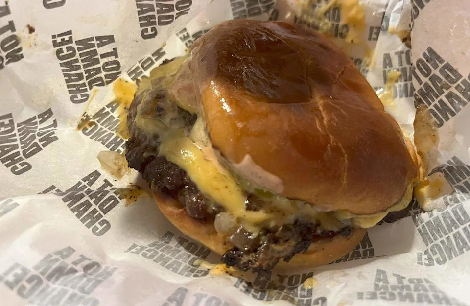The $16 NADC Burger has double-smashed wagyu patties, American cheese, grilled onions, jalapenos, pickles and secret sauce. There is “not a damn chance” for customers to make any modifications.