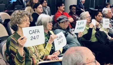 Members from a civil rights advocacy group Austin Sanctuary Network vocalized their desire for Counsel at First Appearance in Travis County during Commissioners Court on Jan. 28. (Haley McLeod/Community Impact)