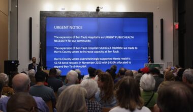 A photo of the public in a town hall