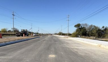 A road in Schertz, Texas is seen under construction on a sunny day.