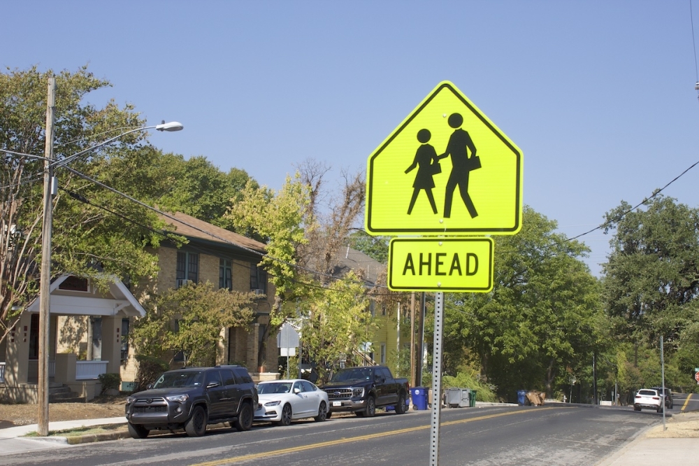 pedestrian crossing street sign