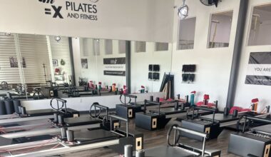 Rows of equipment in a pilates studio