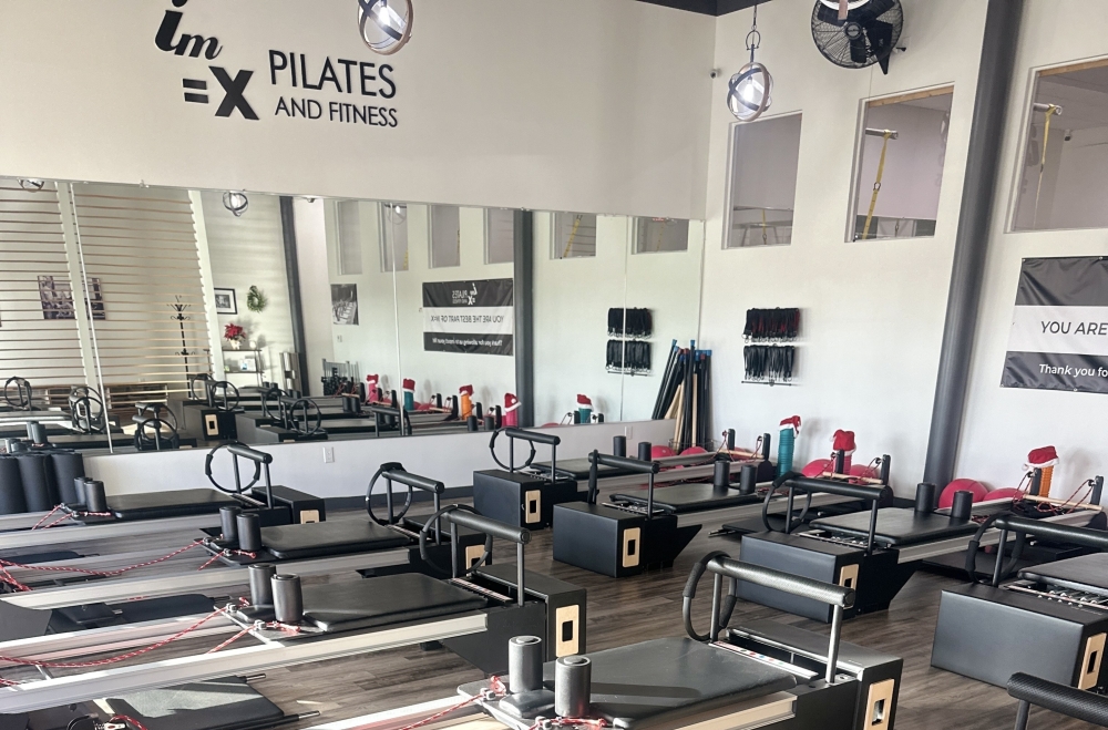 Rows of equipment in a pilates studio