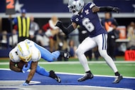 Los Angeles Chargers running back Omarion Hampton (8) plows into the end zone for a fourth...