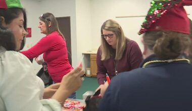APS volunteers pack holiday care bags for seniors in need
