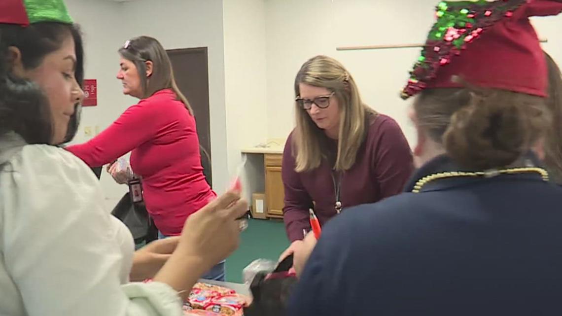 APS volunteers pack holiday care bags for seniors in need