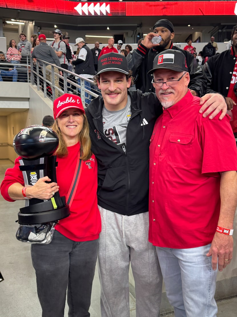 Texas Tech linebacker Ben Roberts poses for a photo with his mother Carrie (left) and father...