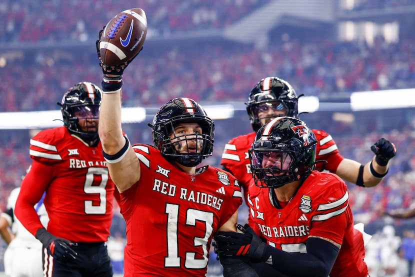 Texas Tech linebacker Ben Roberts (13) celebrates after intercepting a pass during the...