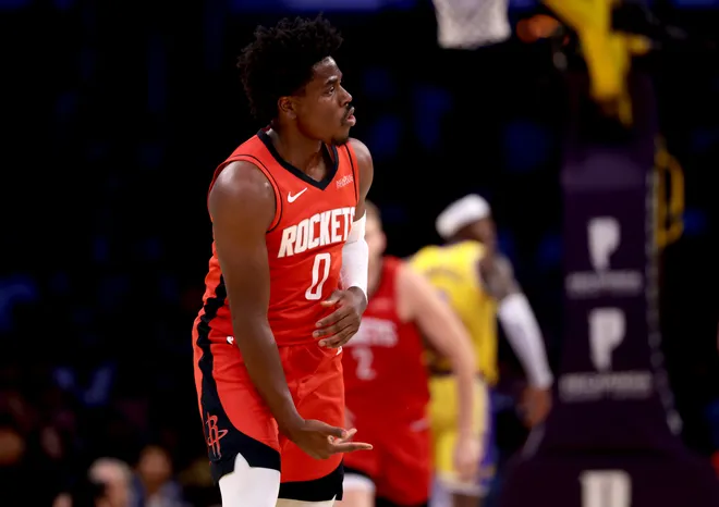LOS ANGELES, CALIFORNIA - APRIL 11: Aaron Holiday #0 of the Houston Rockets celebrates a three-point basket during the second quarter against the Los Angeles Lakers at Crypto.com Arena on April 11, 2025 in Los Angeles, California. NOTE TO USER: User expressly acknowledges and agrees that, by downloading and or using this photograph, User is consenting to the terms and conditions of the Getty Images License Agreement. (Photo by Katelyn Mulcahy/Getty Images)