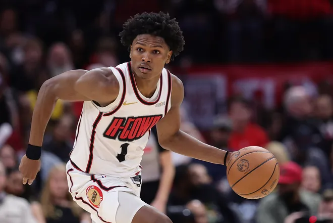 HOUSTON, TEXAS - JANUARY 05: Amen Thompson #1 of the Houston Rockets handles the ball against the Los Angeles Lakers during the second half at Toyota Center on January 05, 2025 in Houston, Texas. NOTE TO USER: User expressly acknowledges and agrees that, by downloading and or using this photograph, User is consenting to the terms and conditions of the Getty Images License Agreement. (Photo by Alex Slitz/Getty Images)