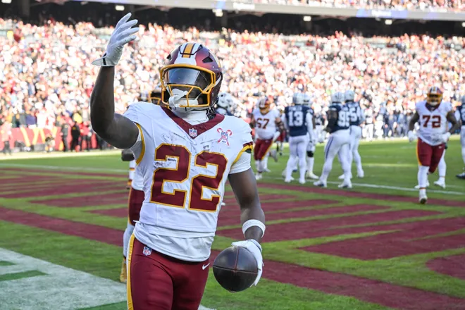LANDOVER, MARYLAND - DECEMBER 25: Jacory Croskey-Merritt #22 of the Washington Commanders celebrates after his rushing touchdown against the Dallas Cowboys in the second quarter of a game at Northwest Stadium on December 25, 2025 in Landover, Maryland. (Photo by Greg Fiume/Getty Images)