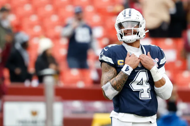 Dec 25, 2025; Landover, Maryland, USA; Dallas Cowboys quarterback Dak Prescott (4) looks on during warmups before the game against the Washington Commanders at Northwest Stadium. Mandatory Credit: Geoff Burke-Imagn Images