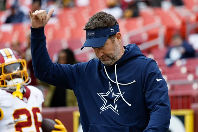 Dec 25, 2025; Landover, Maryland, USA; Dallas Cowboys head coach Brian Schottenheimer looks on during warmups before the game against the Washington Commanders at Northwest Stadium. Mandatory Credit: Amber Searls-Imagn Images
