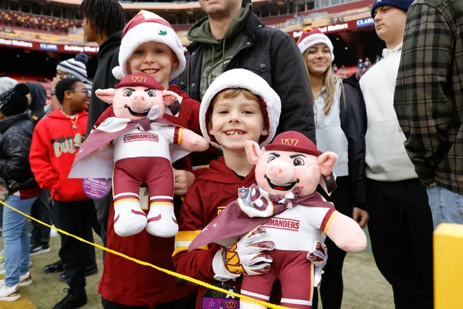 Dec 25, 2025; Landover, Maryland, USA; Washington Commanders fans watch warmups before the game against the Dallas Cowboys at Northwest Stadium. Mandatory Credit: Amber Searls-Imagn Images