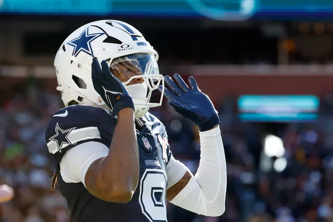 Dec 25, 2025; Landover, Maryland, USA; Dallas Cowboys wide receiver Kavontae Turpin (9) celebrates after scoring a touchdown against the Washington Commanders in the second quarter at Northwest Stadium. Mandatory Credit: Amber Searls-Imagn Images