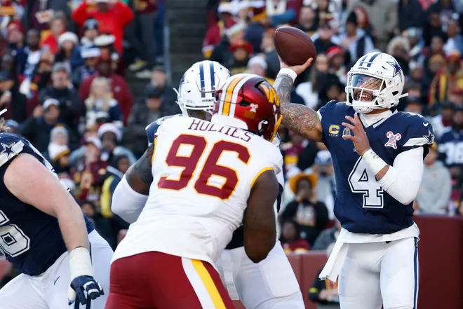 Dec 25, 2025; Landover, Maryland, USA; Dallas Cowboys quarterback Dak Prescott (4) passes the ball against the Washington Commanders in the first half at Northwest Stadium. Mandatory Credit: Amber Searls-Imagn Images
