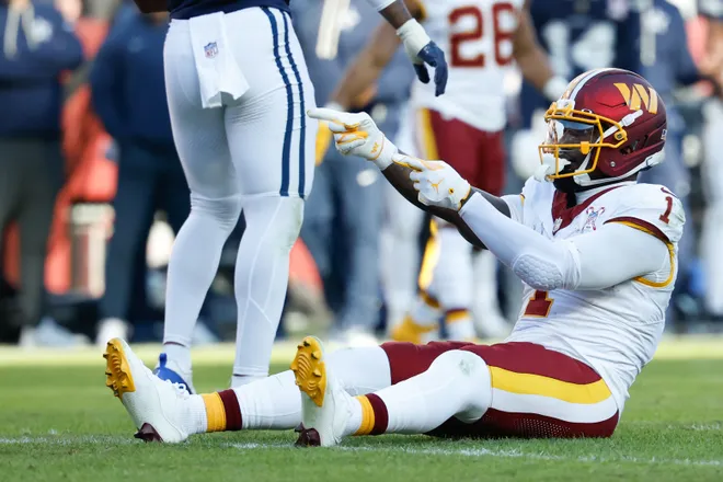 Dec 25, 2025; Landover, Maryland, USA; Washington Commanders wide receiver Deebo Samuel (1) reacts after a play against the Dallas Cowboys in the second quarter at Northwest Stadium. Mandatory Credit: Geoff Burke-Imagn Images