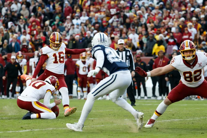 Dec 25, 2025; Landover, Maryland, USA; Washington Commanders place kicker Jake Moody (16) kicks a field goal against the Dallas Cowboys in the third quarter at Northwest Stadium. Mandatory Credit: Geoff Burke-Imagn Images