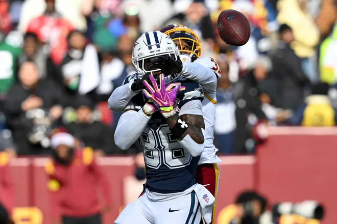 LANDOVER, MARYLAND - DECEMBER 25: Jonathan Jones #31 of the Washington Commanders breaks up a pass intended for Ceedee Lamb #88 of the Dallas Cowboys in the first quarter of a game at Northwest Stadium on December 25, 2025 in Landover, Maryland. (Photo by Greg Fiume/Getty Images)