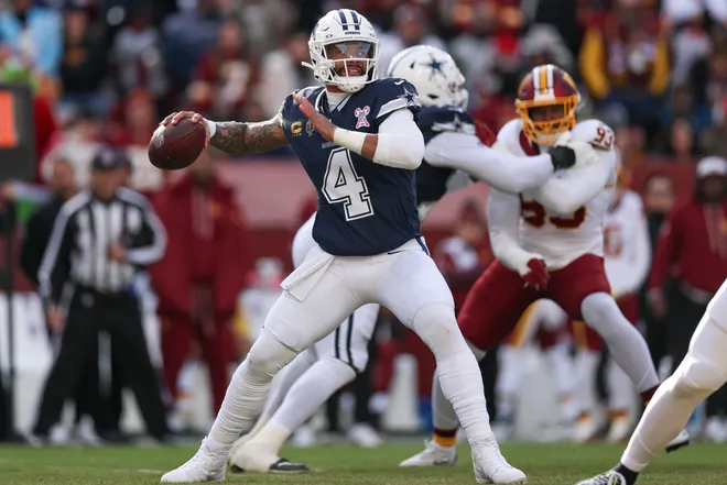 LANDOVER, MARYLAND - DECEMBER 25: Dak Prescott #4 of the Dallas Cowboys looks to pass against the Washington Commanders in the first quarter of a game at Northwest Stadium on December 25, 2025 in Landover, Maryland. (Photo by Scott Taetsch/Getty Images)