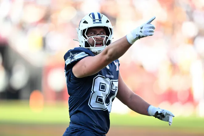 LANDOVER, MARYLAND - DECEMBER 25: Jake Ferguson #87 of the Dallas Cowboys reacts after a play against the Washington Commanders in the first quarter of a game at Northwest Stadium on December 25, 2025 in Landover, Maryland. (Photo by Greg Fiume/Getty Images)