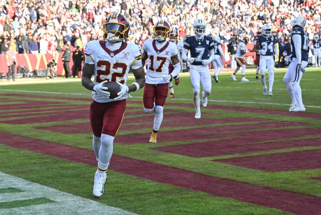 LANDOVER, MARYLAND - DECEMBER 25: Jacory Croskey-Merritt #22 of the Washington Commanders celebrates after his rushing touchdown against the Dallas Cowboys in the second quarter of a game at Northwest Stadium on December 25, 2025 in Landover, Maryland. (Photo by Greg Fiume/Getty Images)
