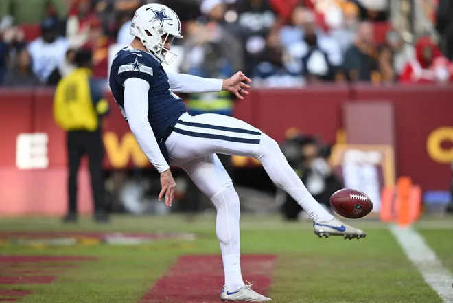 LANDOVER, MARYLAND - DECEMBER 25: Bryan Anger #5 of the Dallas Cowboys punts in the third quarter of a game against the Washington Commanders at Northwest Stadium on December 25, 2025 in Landover, Maryland. (Photo by Greg Fiume/Getty Images)