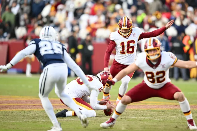 LANDOVER, MARYLAND - DECEMBER 25: Jake Moody #16 of the Washington Commanders kicks a field goal in the fourth quarter of a game against the Dallas Cowboys at Northwest Stadium on December 25, 2025 in Landover, Maryland. (Photo by Greg Fiume/Getty Images)