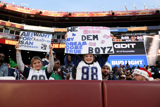 LANDOVER, MARYLAND - DECEMBER 25: Dallas Cowboys cheer during the second half of a game against the Washington Commanders at Northwest Stadium on December 25, 2025 in Landover, Maryland. (Photo by Scott Taetsch/Getty Images)