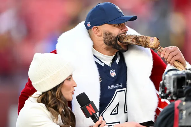 LANDOVER, MARYLAND - DECEMBER 25: Dak Prescott #4 of the Dallas Cowboys eats a steak after his team's 30-23 victory against the Washington Commanders at Northwest Stadium on December 25, 2025 in Landover, Maryland. (Photo by Greg Fiume/Getty Images)