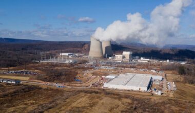 A data center owned by Amazon Web Services, front right, is under construction next to the Susquehanna nuclear power plant in Berwick, Pa., on Tuesday, Jan. 14, 2025. (AP Photo/Ted Shaffrey)