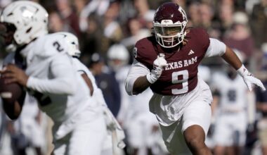 Texas A&M defensive end Cashius Howell (9) rushes Samford quarterback Quincy Crittendon (2) during the first quarter of an NCAA college football game Saturday, Nov. 22, 2025, in College Station, Texas. (AP Photo/Sam Craft)