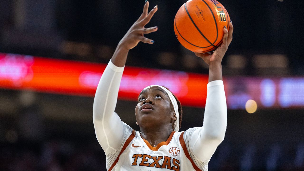 Texas center Kyla Oldacre (00) goes up to score against Southeastern Louisiana during the second half of an NCAA college basketball game Sunday, Dec. 28, 2025, in Austin, Texas. (AP Photo/Stephen Spillman)