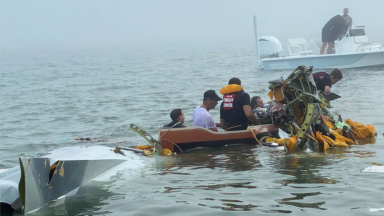 In this image provided by Sky Decker Jr., authorities and volunteers respond to a Mexican Navy plane crash near Galveston, Texas, Monday, Dec. 22, 2025. (Sky Decker Jr. via AP)