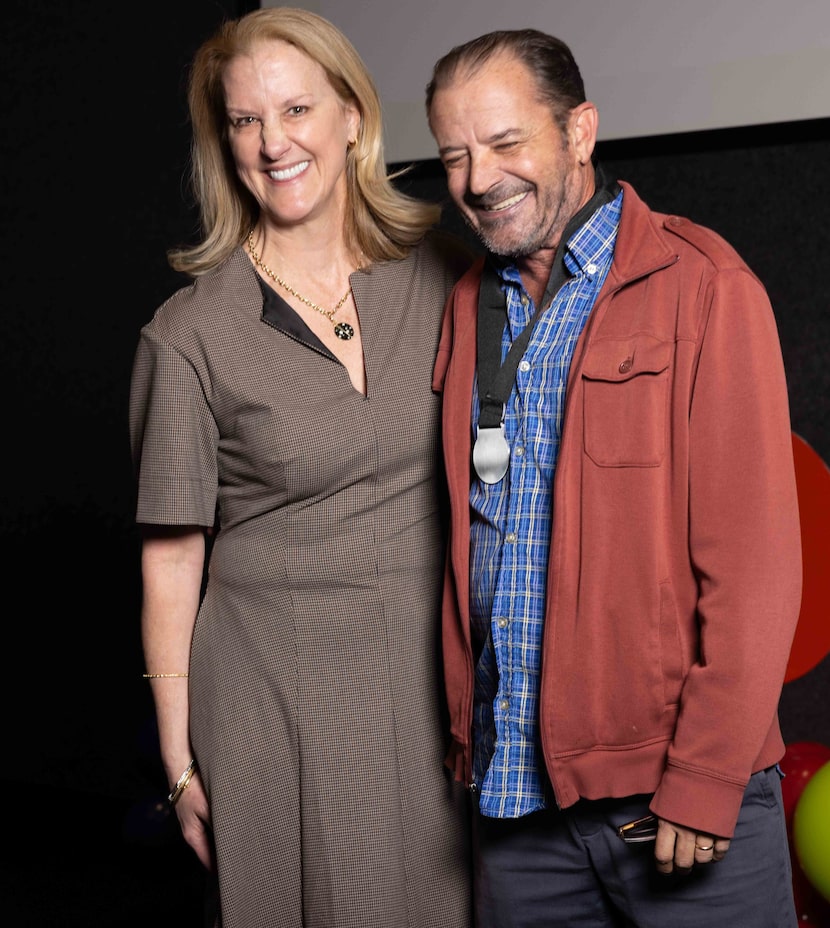 TOP award recipient Michael Hogue (right) poses with Murray during the STICI Value Awards at...